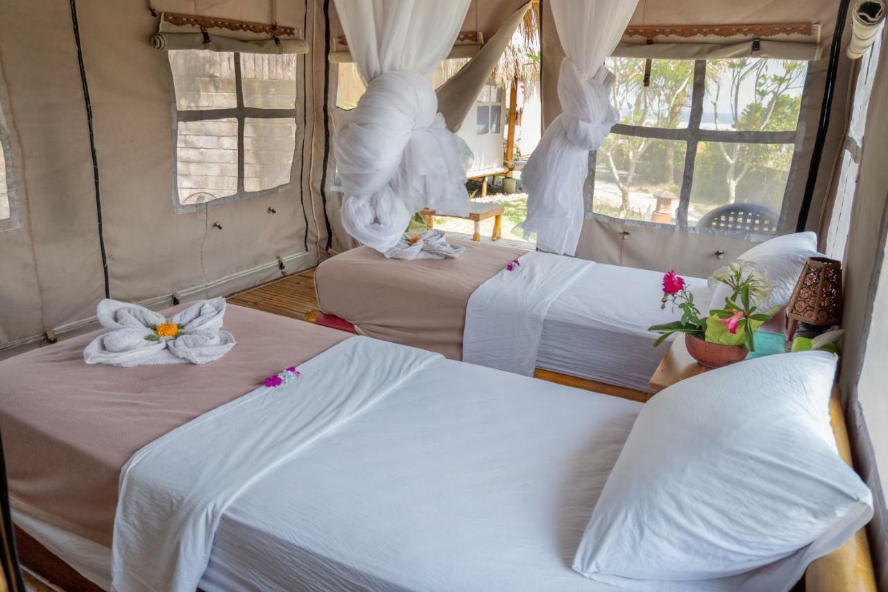 Bali Tiger Surf and Beach Camp Hotel Pulukan Exterior foto